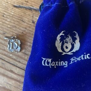 Waxing Poetic Crest Insignia “D” Charm